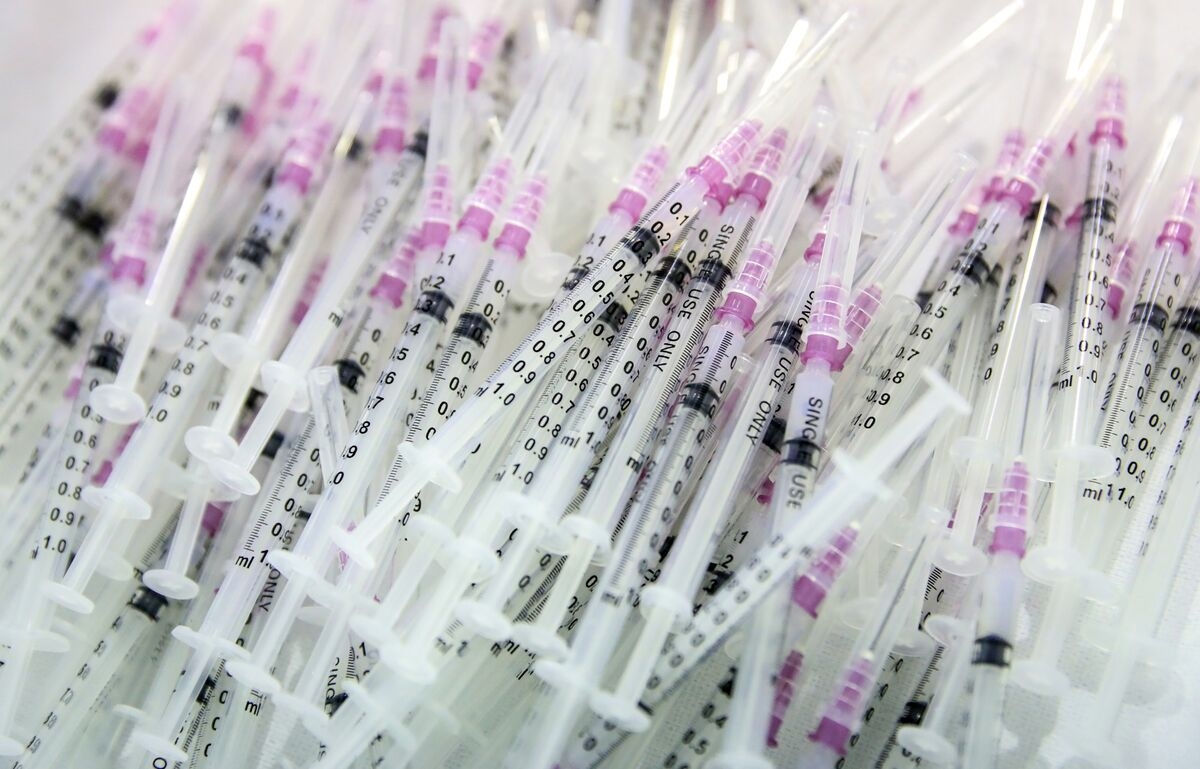 Covid Test, Vaccine Maker Stocks Jump as Cases Surge in Asia