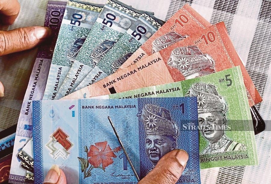 Ringgit opens higher against greenback amid weaker US economic data
