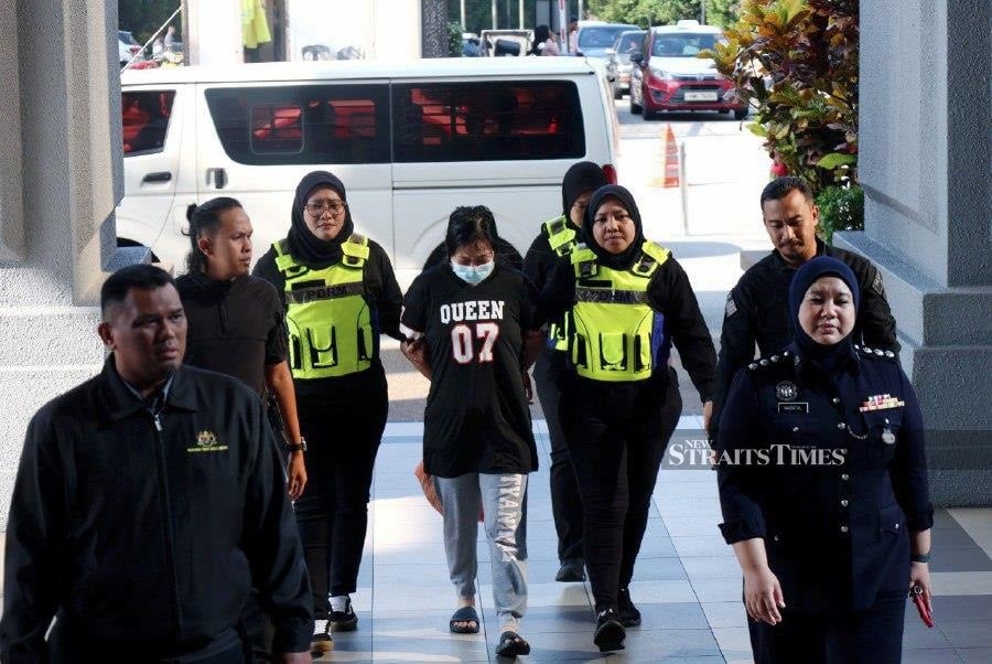 Adoptive mum charged with murder of 7-month-old baby