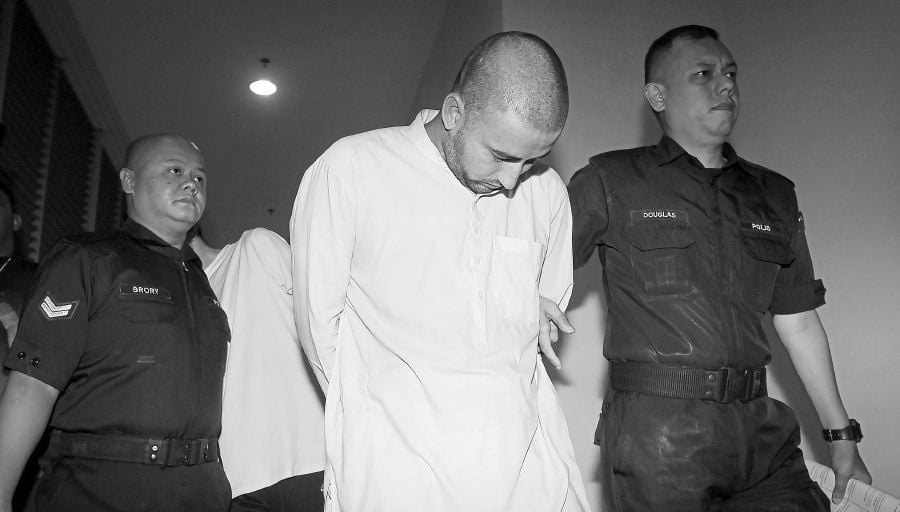Pakistani man in tears after charged with sodomising, sexually assaulting boys