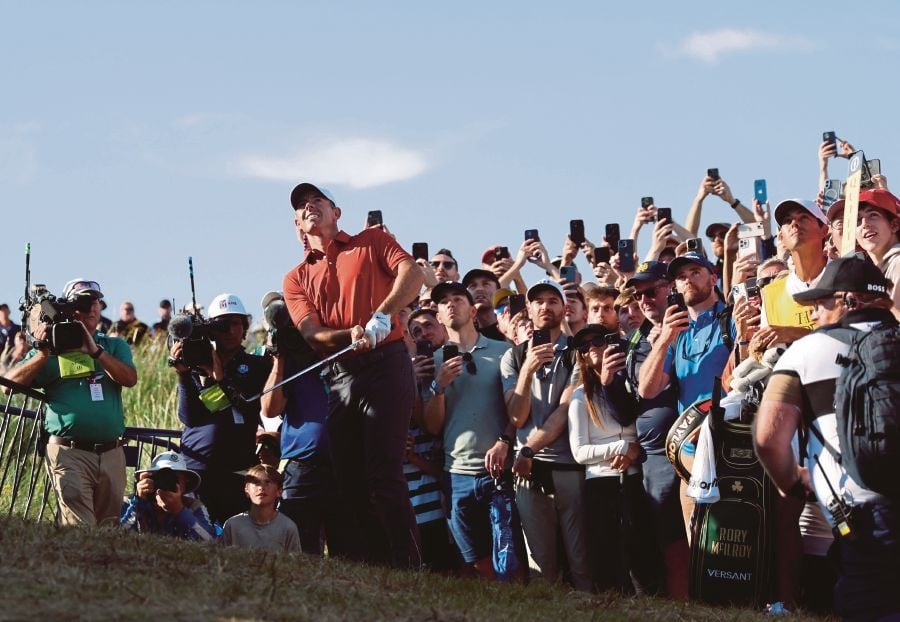 McIlroy rides luck and crowd support to keep Open dream alive