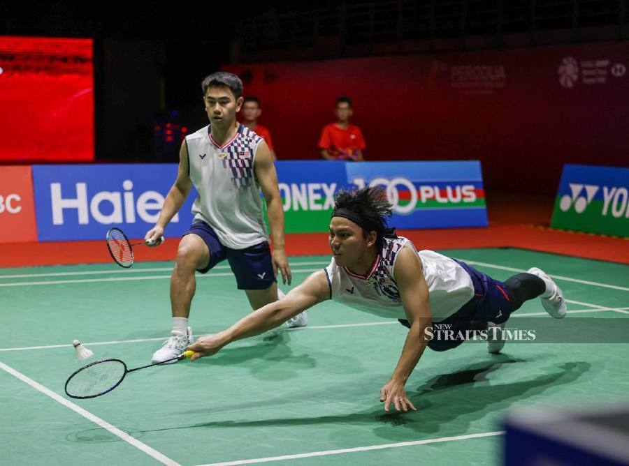 What caused Sze Fei-Izzuddin's downfall at Malaysia Masters?