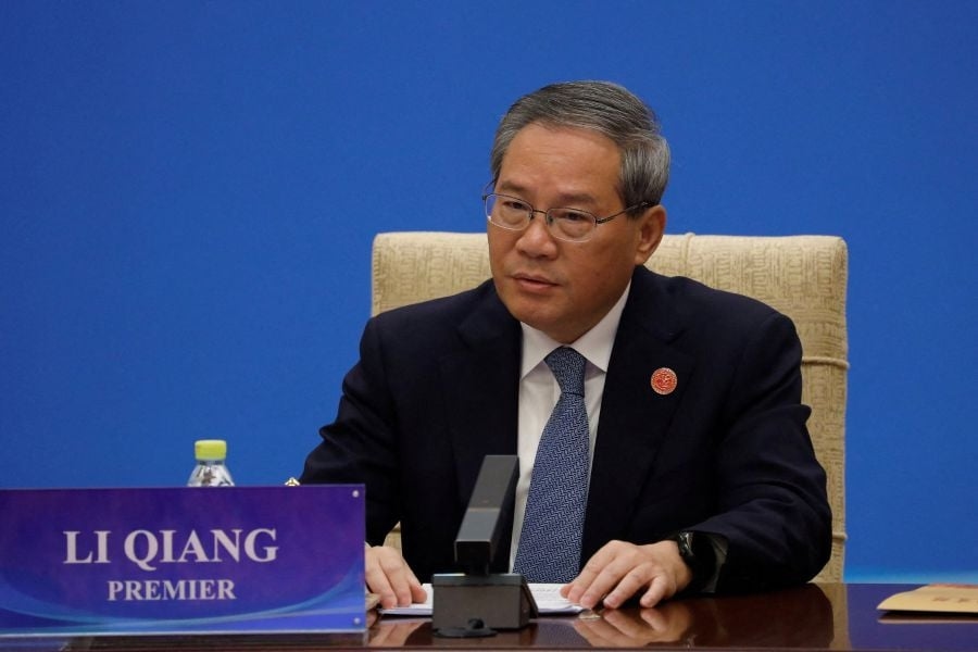 China's premier warns global trade tensions 'intensifying'
