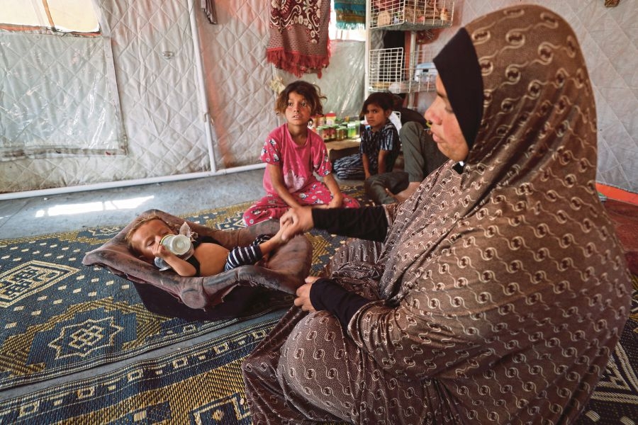 A Gazan family's descent towards starvation