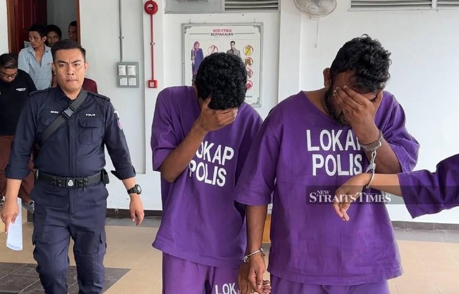 Father, son charged over 'road show' robberies targeting foreigners