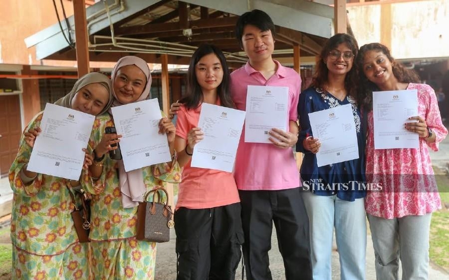 Triple twin triumph: SMK Bukit Jambul celebrates 'straight As' SPM results