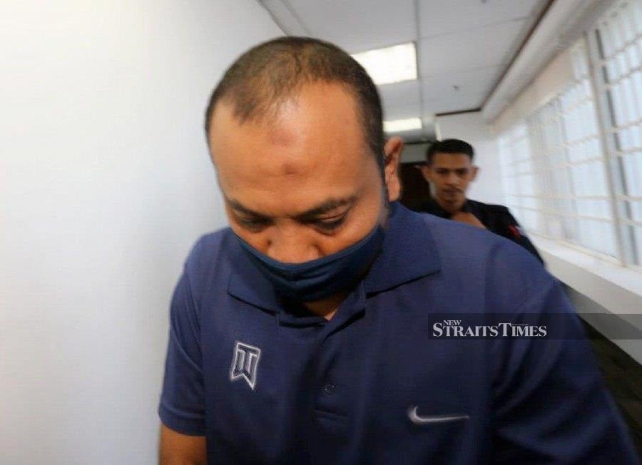 Felda manager charged with eight counts of using forged documents