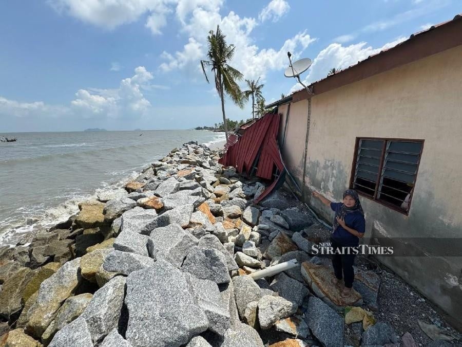 Coastal erosion closes in on village homes in Tanjung Dawai