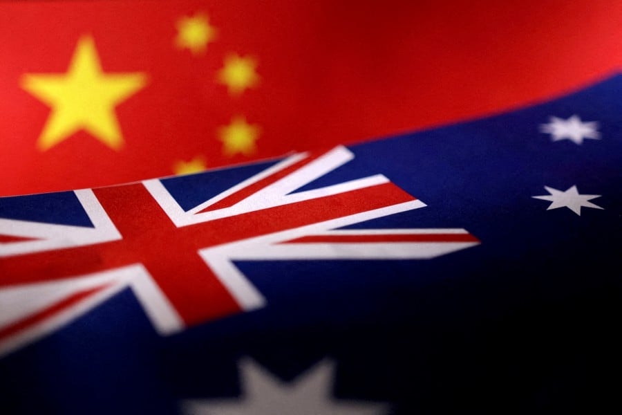 Australia says foreign interference not tolerated after Chinese woman arrested