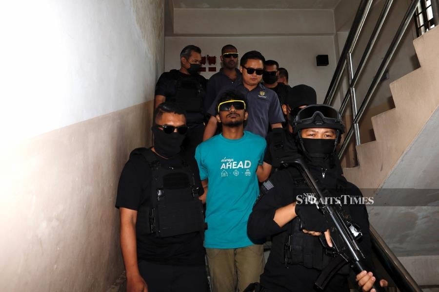Two Bangladeshi men charged with terrorism-related offences