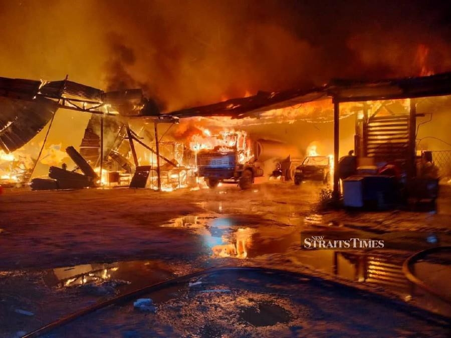 Early morning fire destroys timber mill, workers' quarters and vehicles