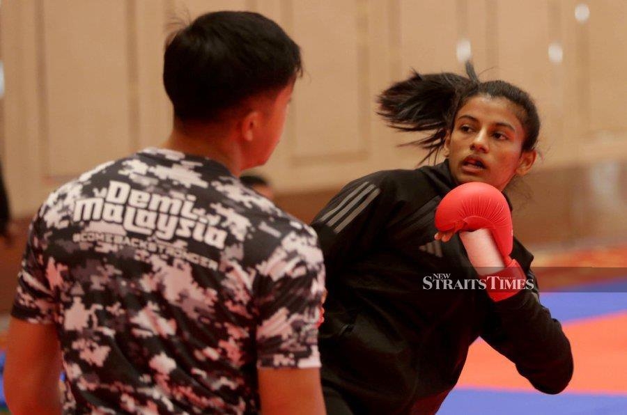 Karateka Shahmalarani stuns world champ to reach Asian final