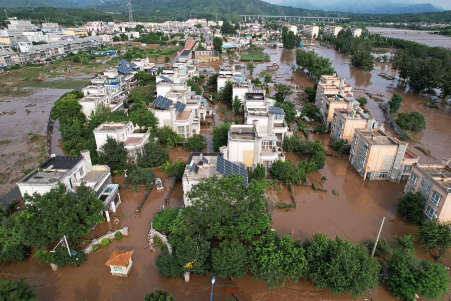 Thirty dead in Beijing following heavy rain
