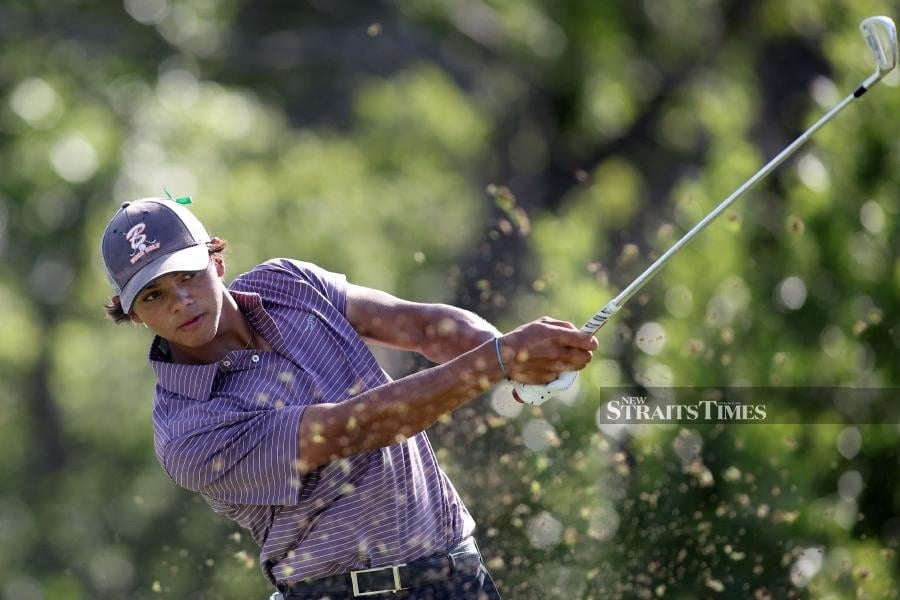 Tiger watches son Charlie's tough start at US Junior Amateur