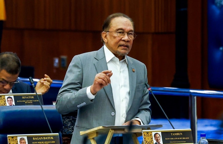 Anwar tells opposition to read 13MP, refutes claims it sidelines Bumiputera