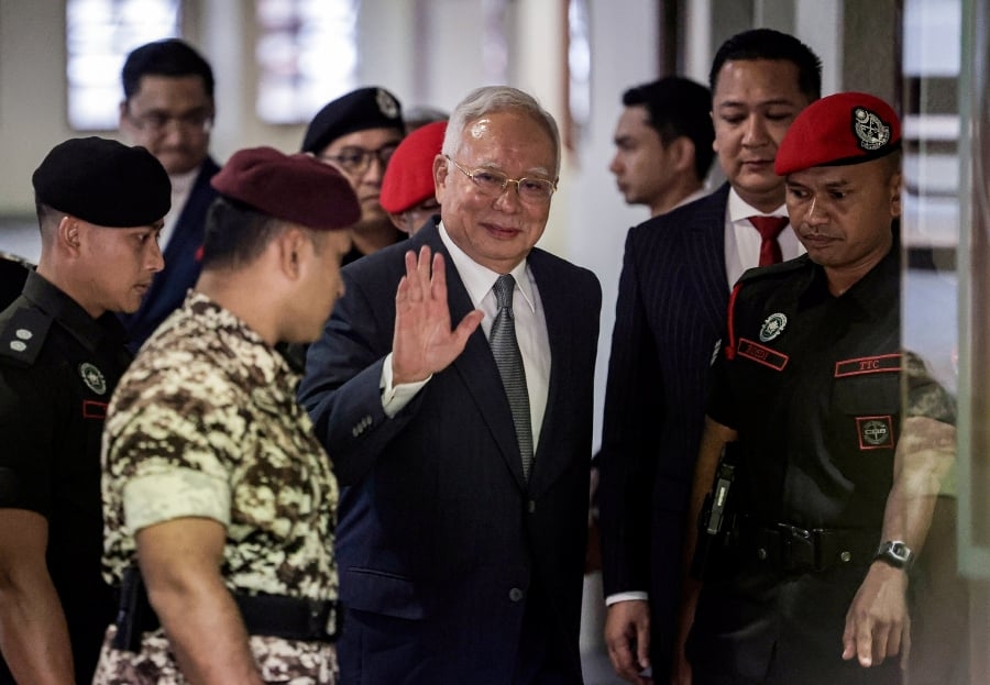 [UPDATED] 'Fewer cases hanging over him': Najib happy with SRC DNAA