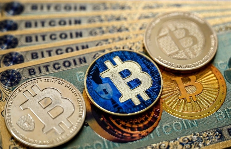 Bitcoin hits fresh record as Fed easing bets add to tailwinds