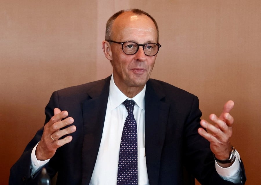 After busy first 100 days, Germany's Merz faces discord at home