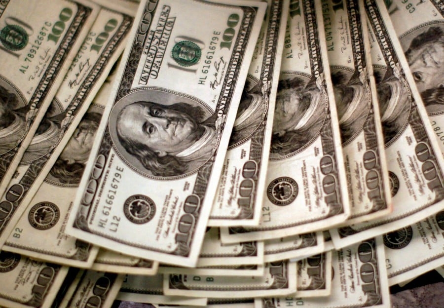 Dollar lingers at its weakest in over three years as traders bet on US rate cuts