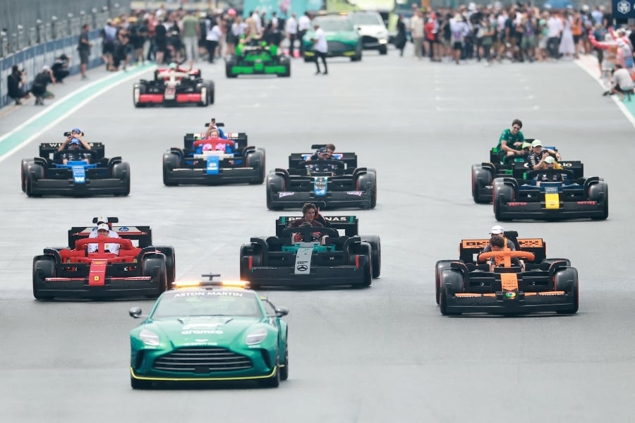 It's lights out and away they Lego for F1 drivers parade in Miami