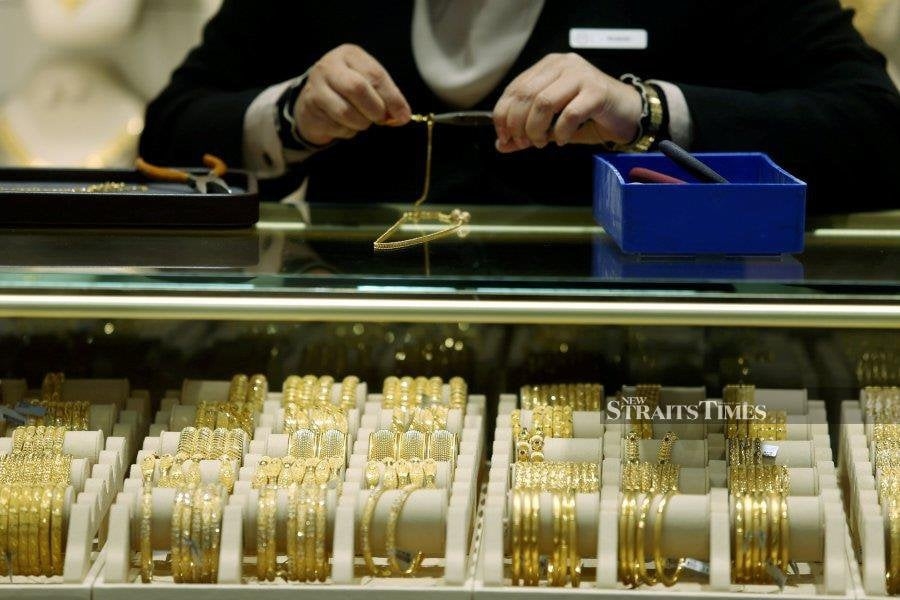 Gold touches over one-week low after US court blocks Trump's tariffs