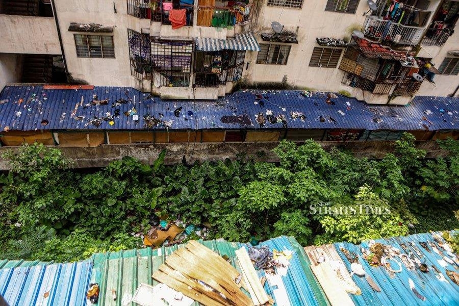 'Jumanji Flats' residents endure squalor, pin hopes on redevelopment plans