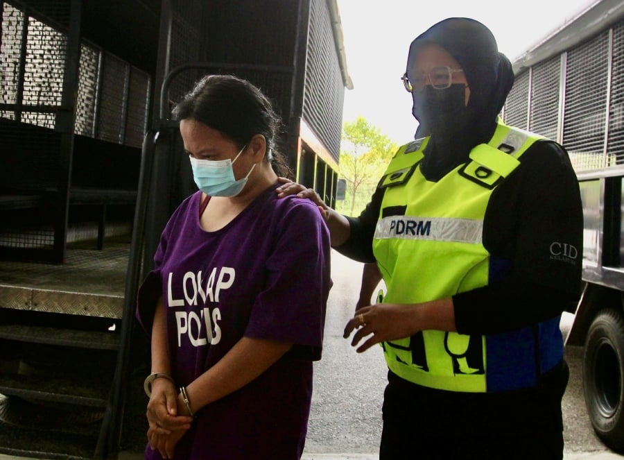 Woman charged over knife attack on husband