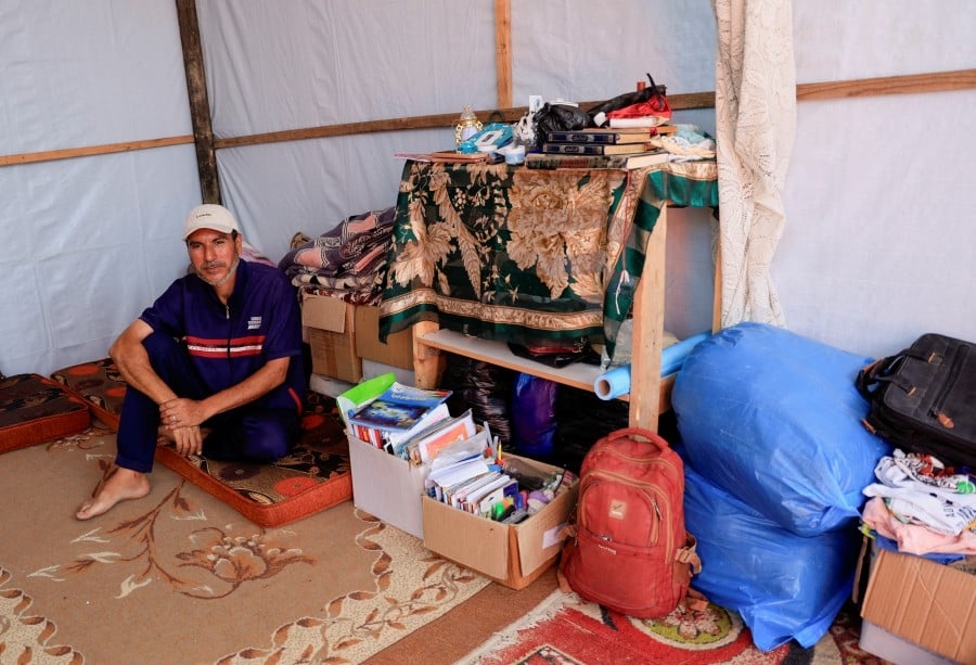 Braving bullets and bodies to reach Israeli-approved aid