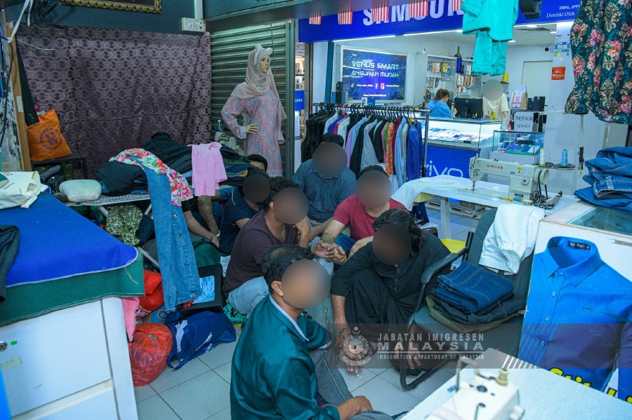 143 migrants nabbed in raid at KL mall