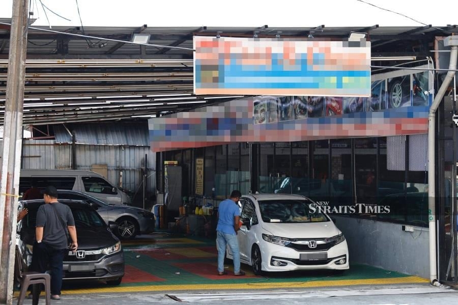 Johor car wash operators face boycott over alleged Singapore bias