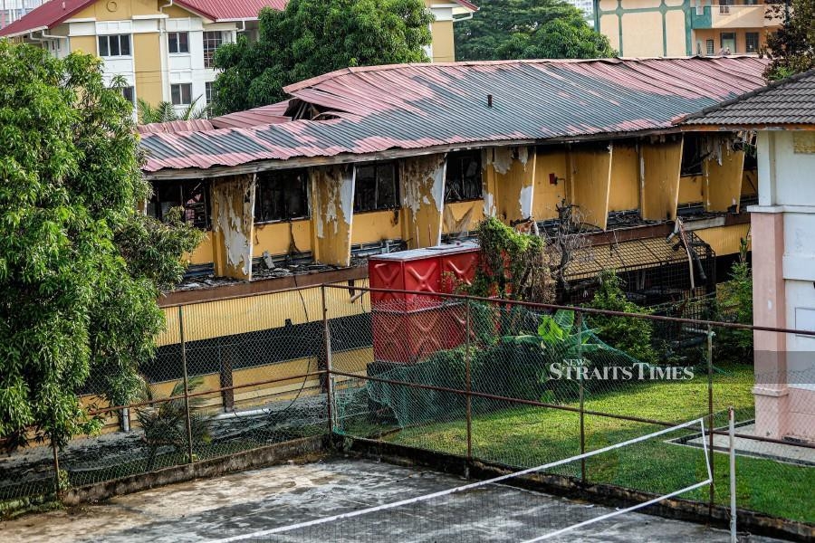 Students escape blaze while attending prayers