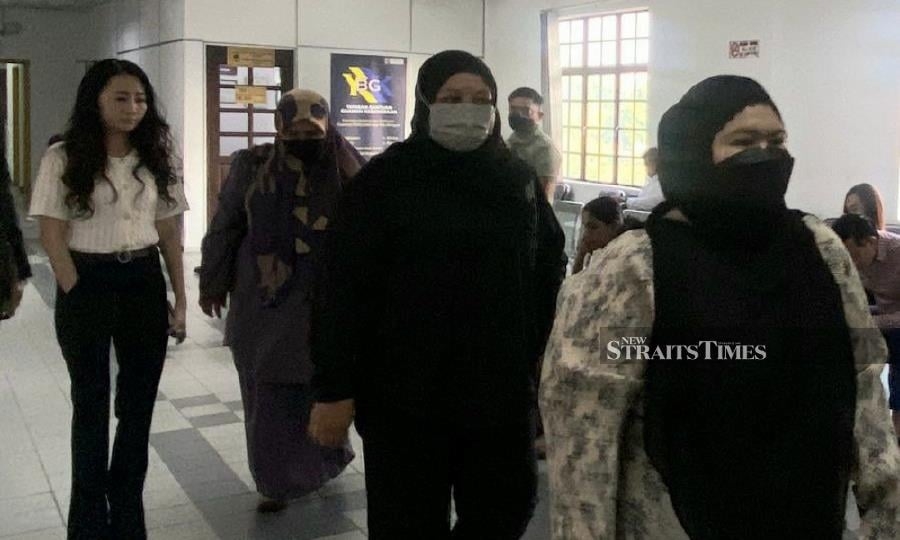 Three women face 106 corruption charges linked to driving test bribes
