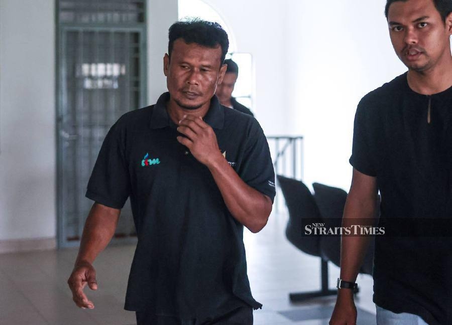 My phone fell into the water, says man after charged with 11 counts of offensive posts about Nurul Izzah