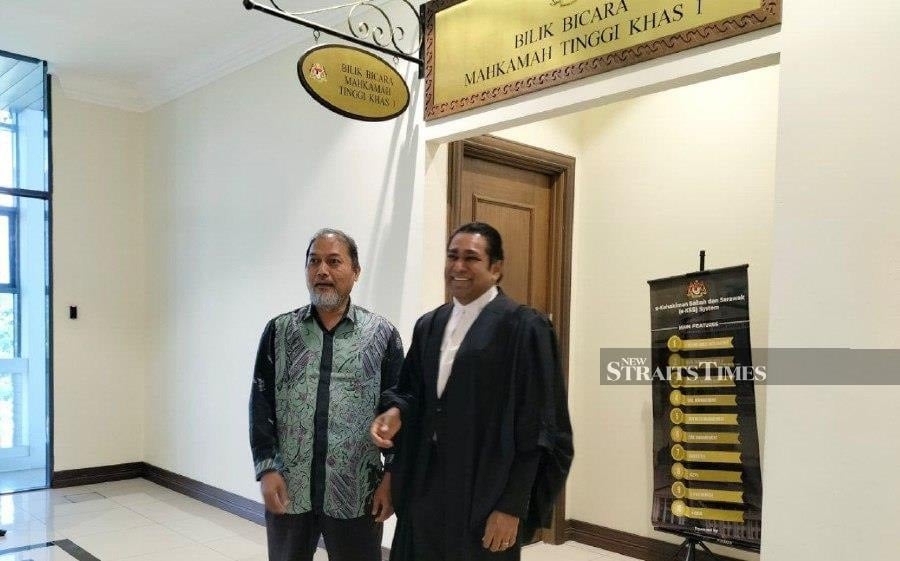 Sabah civil servant acquitted of 14 bribery charges