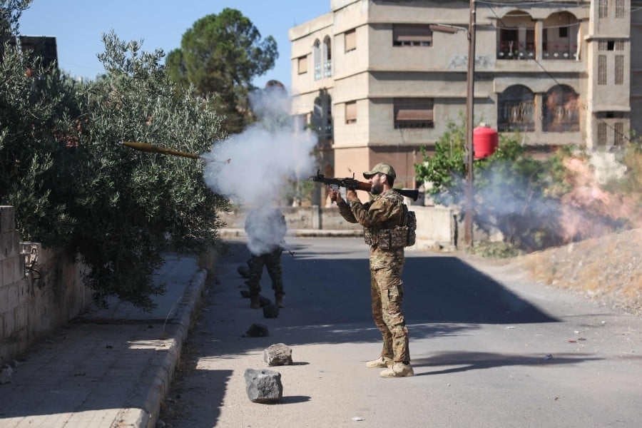 Death toll from southern Syria violence rises to 248