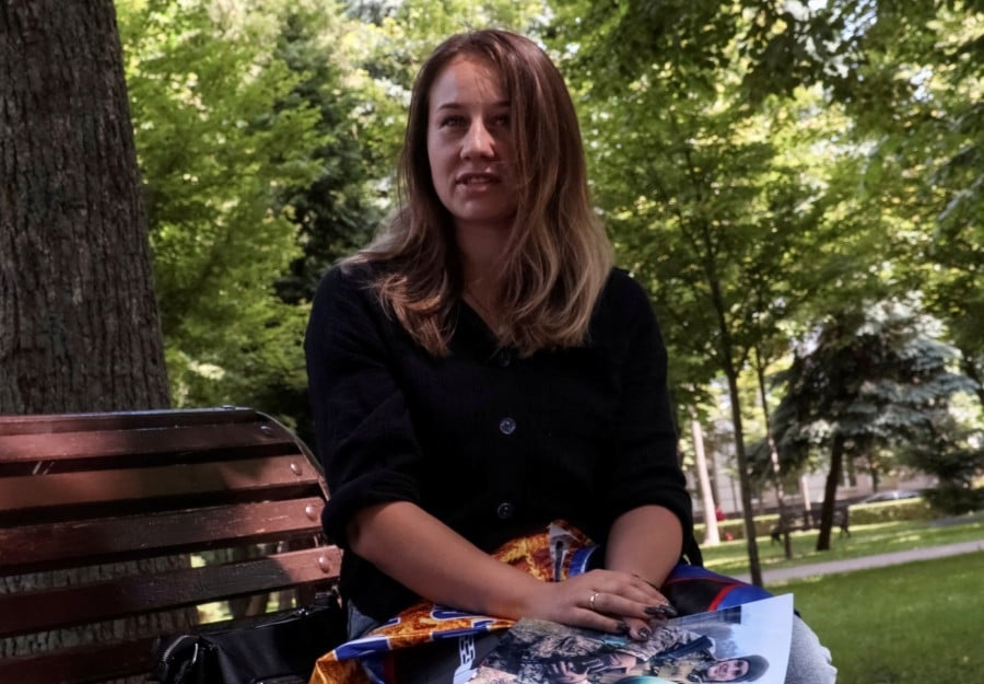 Ukrainian woman searches for husband lost in action two years ago