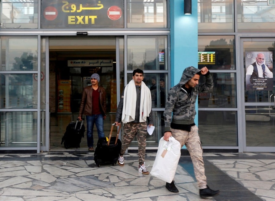 Trump learns lessons from first 'Muslim ban' but raises new questions