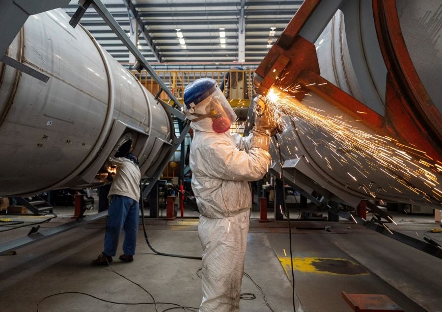 China factory activity cools as demand abroad, at home weakens