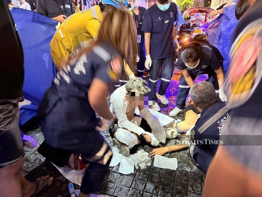 Malaysians set on fire in Bangkok spoke to attacker moments earlier