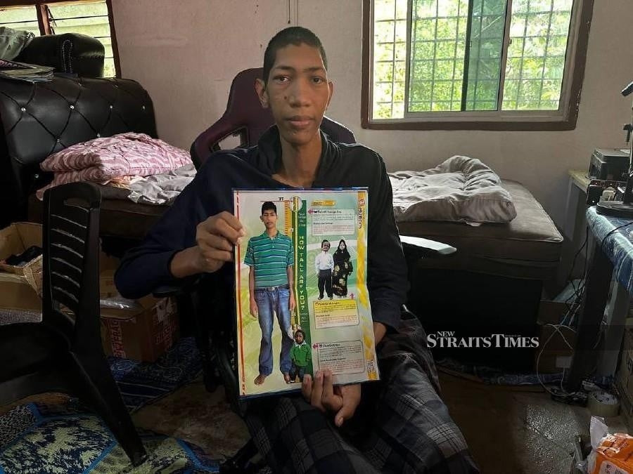 Tallest Malaysian man unable to walk due to spine condition, open to treatment