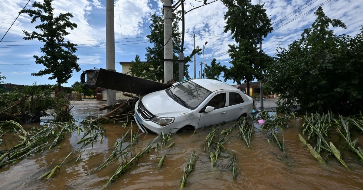 'Once in a hundred years': Villagers clean up after deadly China floods