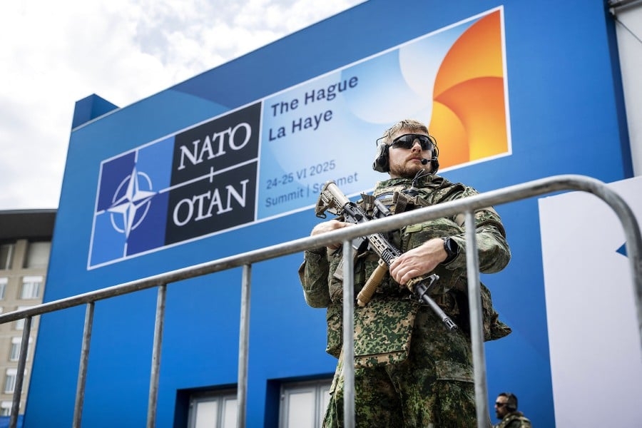 Nato strikes spending deal, but Spain exemption claim risks Trump ire