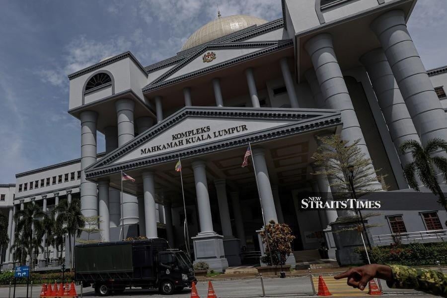 Two tourists get jail for stealing luxury handbag to fund Malaysia trip