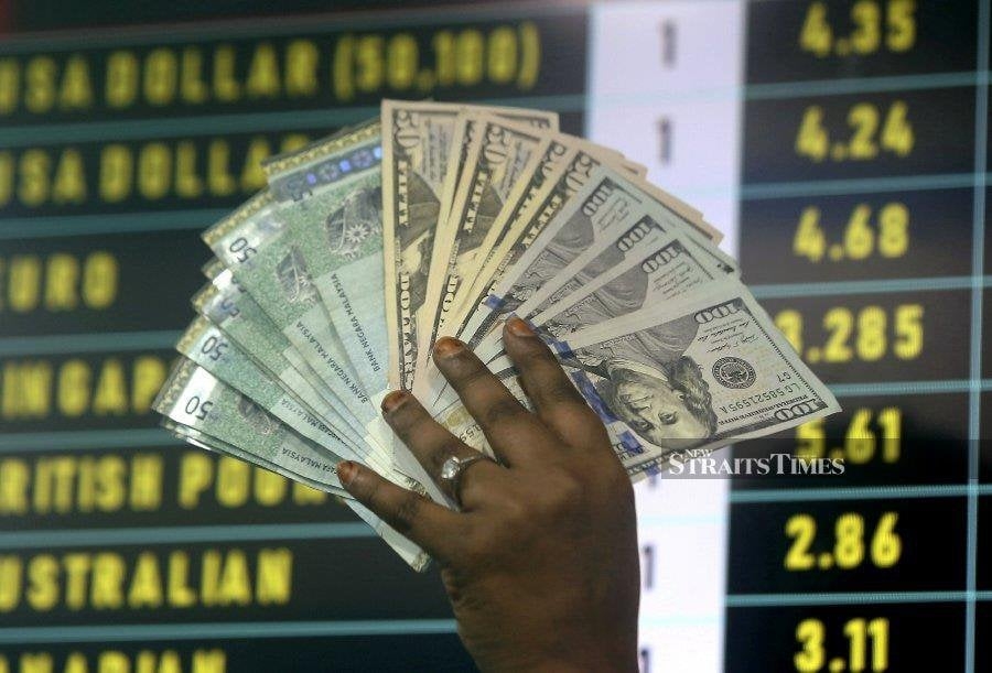Dollar hits 2025 low, Middle East tensions fuel risk-off mood