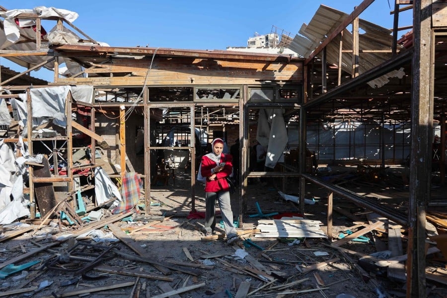 Israel reviews deadly Gaza cafe strike that killed 24