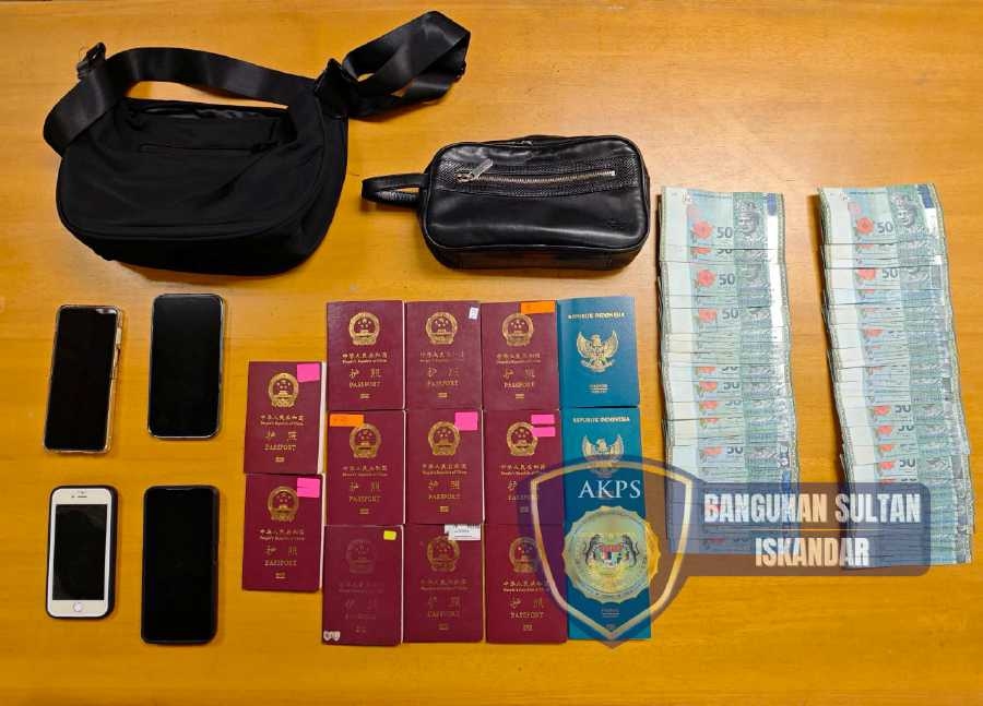 RM200 per passport: Border officers arrested over 'flying passport' racket