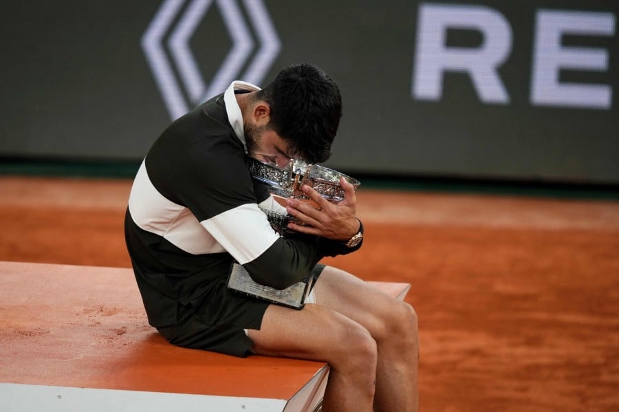 Alcaraz stuns Sinner in all-time great French Open final