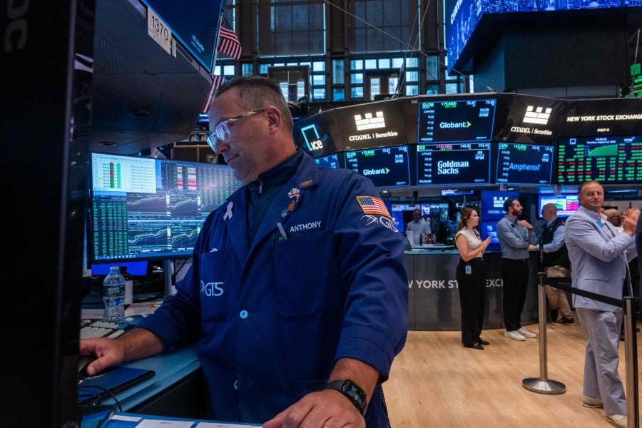 US stocks hit records on steady inflation, China trade truce