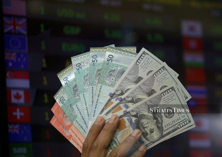 Ringgit strengthens against US dollar as China economic data boosts sentiment