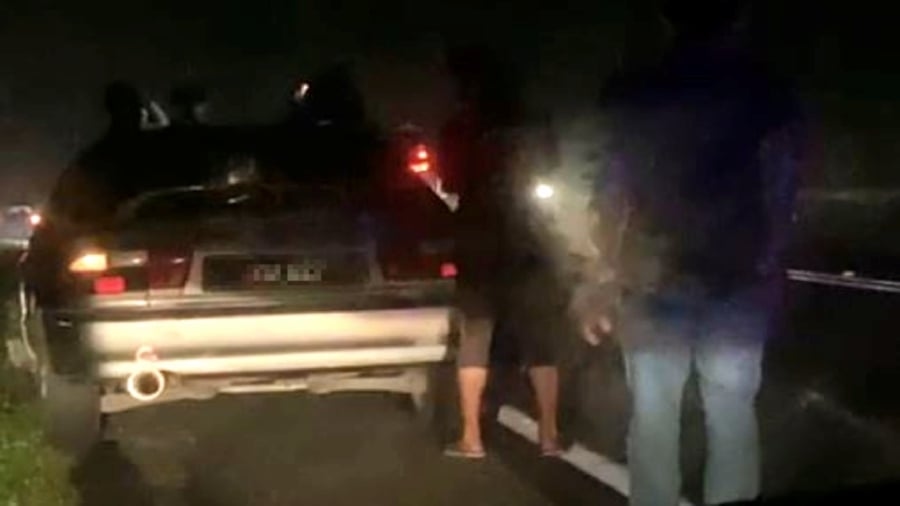 Two men refuelling van by roadside, fatally struck in three-vehicle crash